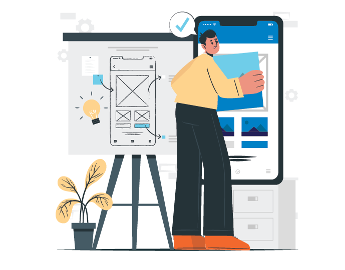 person working with prototyping having in front of him a big mobile screen and on the left a whiteboard with a drown wireframe model